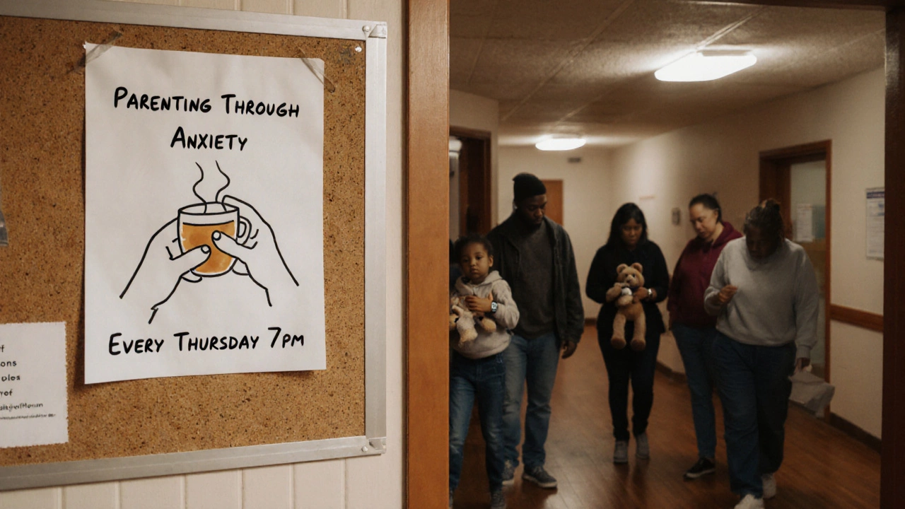 A hand-painted flyer for a parenting support group on a corkboard with a cup of tea nearby.